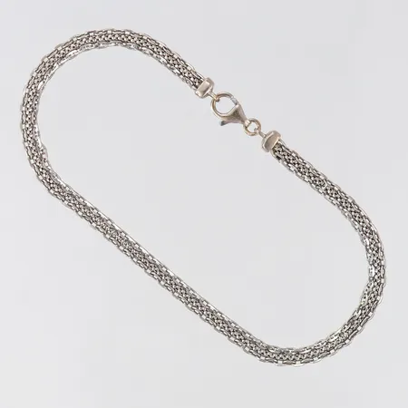 Armband fantasilänk, längd 19cm, bredd 3,3mm, vitguld 18K. Vikt: 5 g
