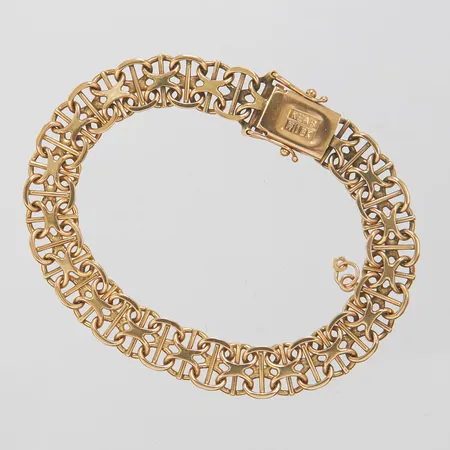 Armband X-länk med stav, längd: 18,3cm, bredd: 9,1mm, tom ögla för berlock, lås glappar, svenska stämplar, 18K Vikt: 19,9 g
