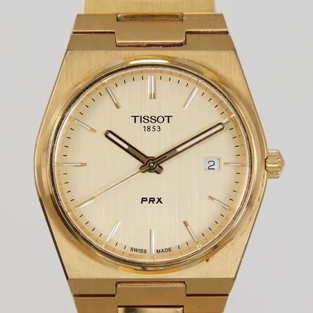 Herrur Tissot PRX, 40mm, kvarts, ref: T137410A, guldtonat stål, guldtonad urtavla, inre omkrets armband ca 19cm, lättare bruksslitage, inga tillbehör.