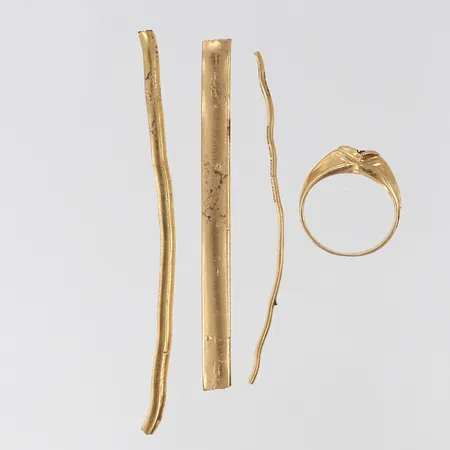 Guldskrot, defekt, 18K.  Vikt: 14,7 g