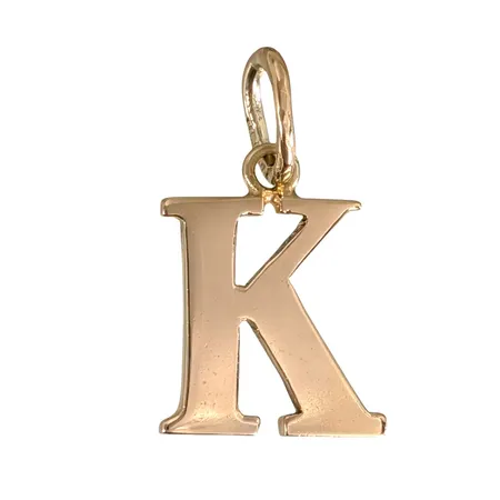 Hänge Bokstaven K, 18K guld, Guldsmed Björn Nilsson AB (GBON), Kristianstad, längd inkl. ögla 21 mm, bredd 12 mm, tjocklek 1,3 mm Vikt: 2 g