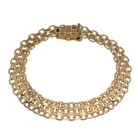 Armband X-länk, 18K guld, Jo-Ans Guld AB, svensk kontrollstämpel, längd knäppt 18,0 cm, bredd 9 mm, fint skick  Vikt: 17,8 g