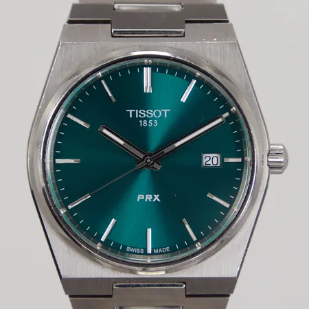 Herrur Tissot PRX, 40mm, kvarts, ref: T137410A, stål, grön urtavla, inre omkrets armband ca 17,5cm, lättare bruksslitage, inga tillbehör.