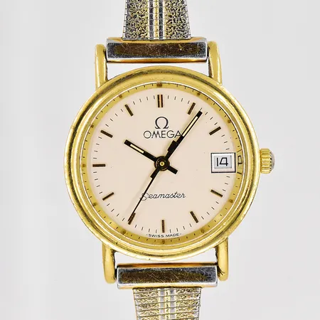 Damur Omega Seamaster, Ø 22mm, 18K, quartz, datum, trög krona, står still, armband doublé, trasigt lås