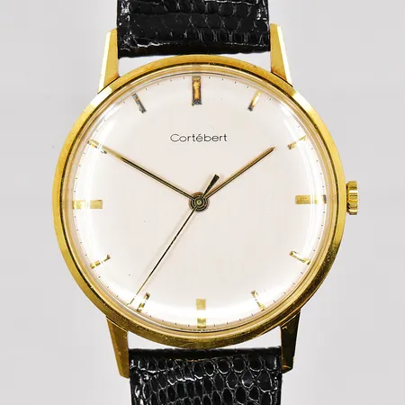 Herrur Cortébert, Ø 34mm, 18K, manuell, läderband