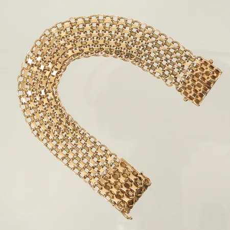 Armband x-länk 19cm bredd 17,8mm saknar en låsåtta, ojämna länkar 18K Vikt: 29,3 g