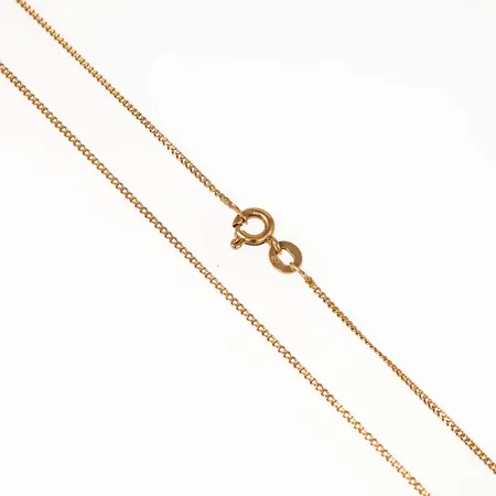 Kedja Pansar i 18K guld. Den är 46,5 cm lång, 1,1 mm bred och väger 2,0g. Springring. Sliten kedja.