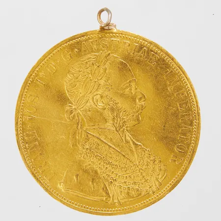 Mynt 4 Dukat, Franz Joseph I, 1915, Ø39,6mm, repigt, skevt, bucklor, ögla i oädel metall, guld 986/1000, bruttovikt 14,0g Vikt: 14 g