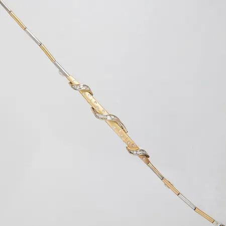 Armband med vita stenar, längd 19cm, bredd 2-5,5mm, tvåfärgad, 14K, bruttovikt 10,1g Vikt: 10,1 g