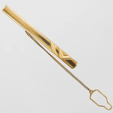 Slipsklämma oädel metall samt 18K guld, 66,9x6,1mm, säkerhetskedja, bruttovikt 7,1g Vikt: 7,1 g