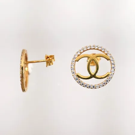 Ett par örhängen med vita stenar 16,5mmx12mm 21k 3,9g Vikt: 3,9 g