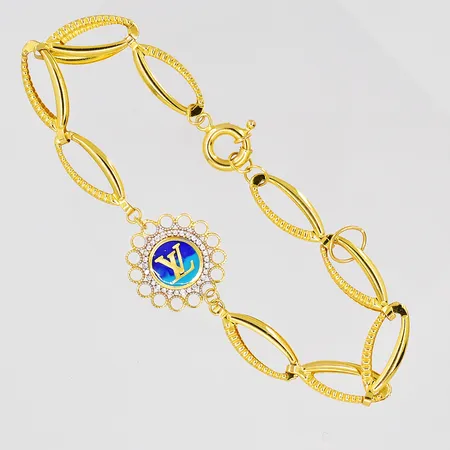 Armband, 18-20cm, bredd 8,5mm, vita stenar, plastdetaljer, 21K Vikt: 7 g