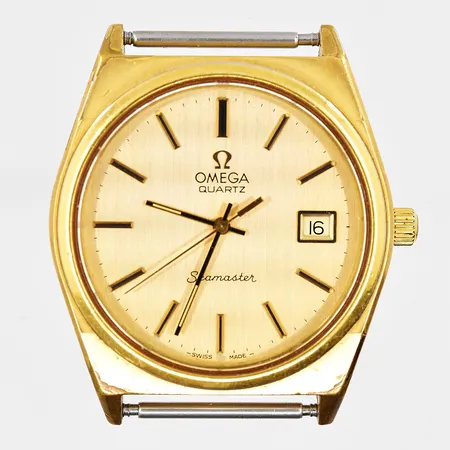 Herrur Omega Seamaster, Ø 35mm, guld/stål, quartz, defekt krona, fungerar ej, graverad boett, band saknas