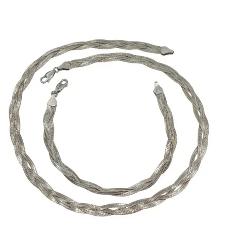 SET - Guldfynd/GFAB, Halsband + Armband, silver 925/1000, flätad modell, längd 43 resp. 18,5 cm, bredd 6 mm Vikt: 18,6 g