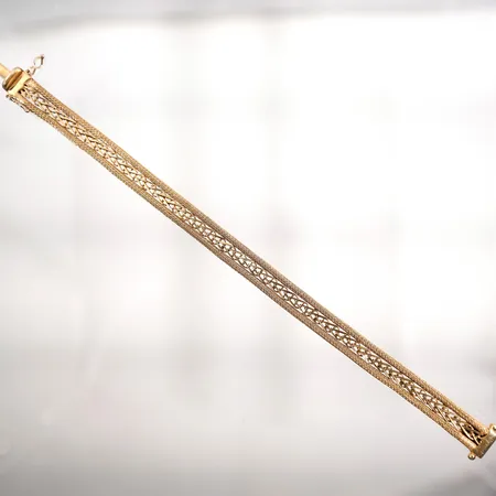 Armband längd 19cm bredd 8mm 18k 20,7g Vikt: 20,7 g