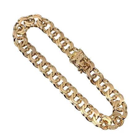 Armband Bismarck, 18K guld, N S E Guldvaru Aktiebolag, Köping, svensk kontrollstämpel, längd knäppt 18,5 cm, bredd 8 mm, fint skick Vikt: 24,7 g