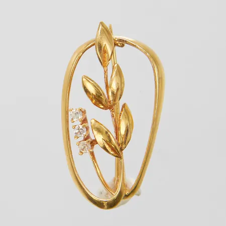 Brosch med vita stenar, 31,5x17,3mm, skev broschnål, 18K Vikt: 4,4 g