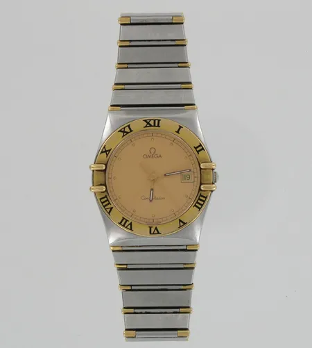 Miesten teräs/kultarannekello Omega Constellation, quartz, nro:54695474, taulun Ø 32mm, hihnan pituus 180mm, paristo loppunut.
