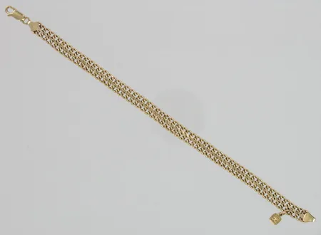 Tuplapanssariranneketju vaakunamaskotilla, käytön jälkiä, pituus 190mm, 585, paino 5,4g Paino: 5,4 g