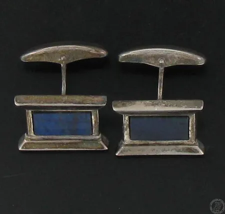 Spektroliittikalvosinnapit, Suomen eduskunta, vuodelta 1994, tekijänleima HM, 925br, paino 12,3g Paino: 12,3 g