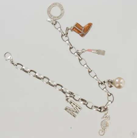 Ranneketju riipuksilla, yksi riipus kulunut, pituus 210mm, 925, paino 29,5g, design Thomas Sabo Paino: 29,5 g