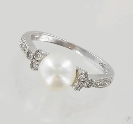 Timanttisormus helmellä 12xn.0.005ct, koko 16½, 375, paino 2,3g Paino: 2,3 g