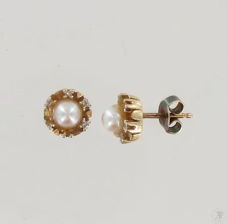 Helmikorvakorut timanteilla, 12xn.0.005ct, 585br, paino 2,4g Paino: 2,4 g