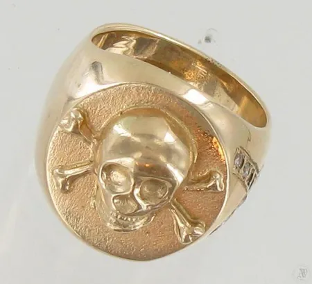 Pääkallosormus timanteilla 10xn.0.02ct, koko 20¼, 585, paino 26,7g Paino: 26,7 g