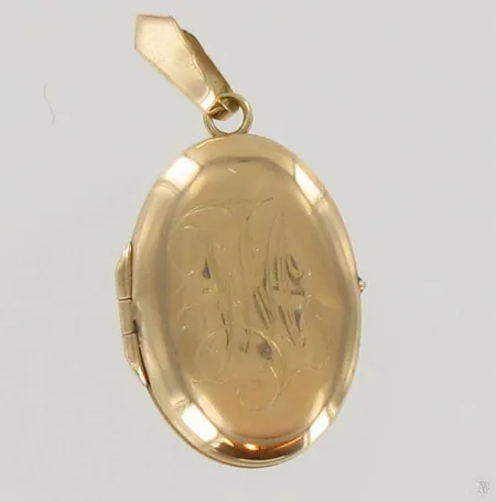 Viallinen medaljonki, 585, paino 2,4g Paino: 2,4 g