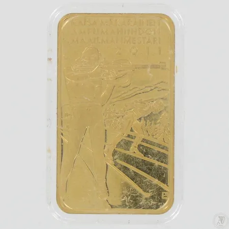 Kullattu harkko, Suomalaisen urheilun huippuhetket, Kaisa Mäkäräinen ampumaahiihdon maailmanmestari 2011, mitat 50x30mm, kullattua pronssia.