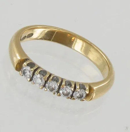 Timanttisormus 5xn.0.04ct, koko 16½, 585, paino 3,4g Paino: 3,4 g