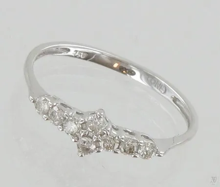 Timanttisormus 8xn.0.03ct, koko 18, 750 valkokulta, paino 1,4g Paino: 1,4 g