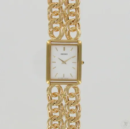 Teräsrannekello Seiko quartz kultarannekkeella, kaiverrettu, 750br, paino 128,6g Paino: 128,6 g