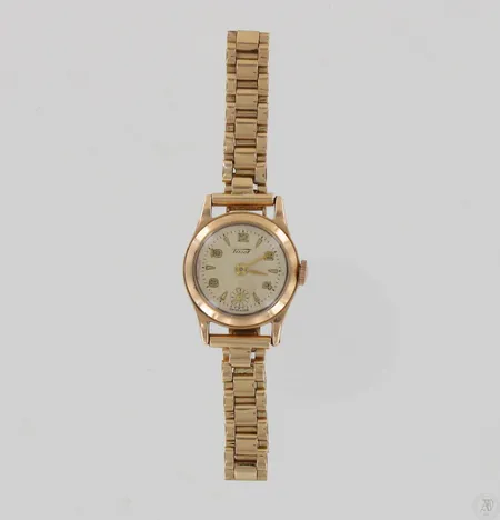 Kultarannekello Tissot, kaiverrettu, mekaaninen, taulun Ø 23mm, taulussa pieniä hapettumia, rannekkeen pituus 156-166mm, 585br, paino 24,1g Paino: 24,1 g