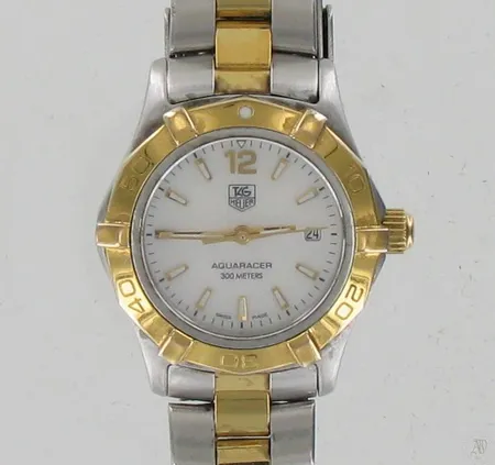 Teräsrannekello TAG Heuer Aquaracer 300 meter, quartz, taulun Ø 27mm, rannekkeen pituus 190mm, mallinumero WAF1424BB0814, sarjanumero YD1453, takuutodistus