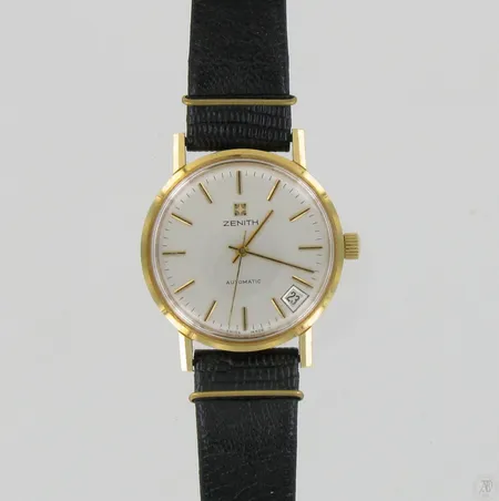 Viallinen kultarannekello Zenith Automatic, kaiverrettu, nahkarannekkeella, taulun Ø 35mm, 750br, paino 47,8g Paino: 47,8 g