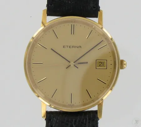 Kultarannekello Eterna, päivyri, alkuperäisellä nahkarannekkeella, kaiverrettu, quartz, Ø 34mm, 585, paino 26,1g, paristo loppu