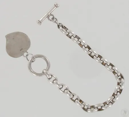Ranneketju riipuksella, käytön jälkiä, pituus 190mm, leveys 7mm, 925, paino 35,1g Paino: 35,1 g