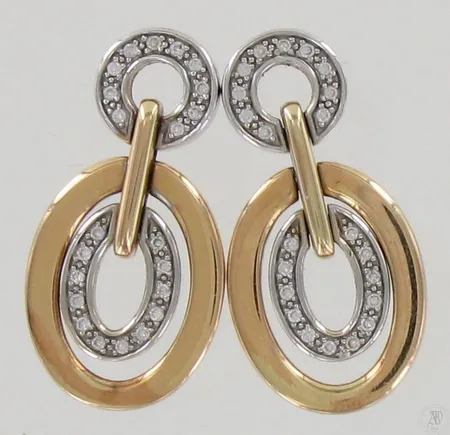 Timanttikorvakorut 44xn.0.005ct, korkeus 30mm, 585 kelta- ja valkokulta, paino 11,9g Paino: 11,9 g