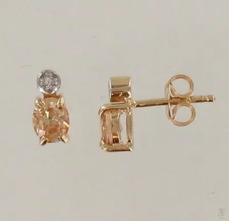 Kivikorvakorut timanteilla 2xn.0.005ct, korkeus 8mm, 585br, paino 1,1g Paino: 1,1 g