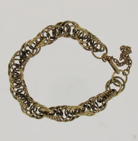 Rannekoru, pituus 200mm, Kalevala Koru, Setukaisten kääty, pronssia
