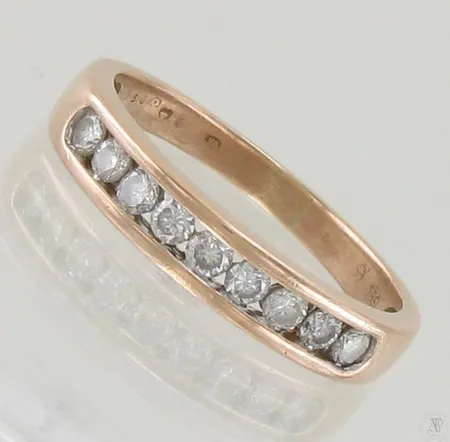 Timanttisormus 9xn.0.05ct, koko 19¼, 585, paino 3,4g Paino: 3,4 g