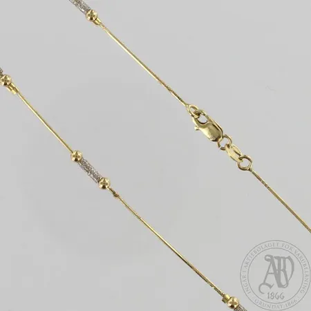 Kaulaketju, pituus 46cm, 585 kelta- ja valkokulta, paino 5,8g Paino: 5,8 g