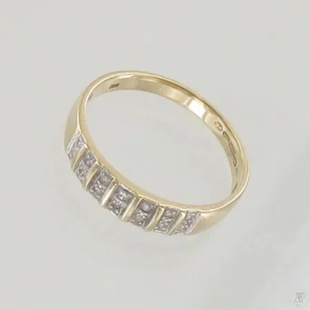 Timanttisormus 10xn.0.005ct, koko 17¾, 585 kelta- ja valkokulta, paino 2,2g Paino: 2,2 g