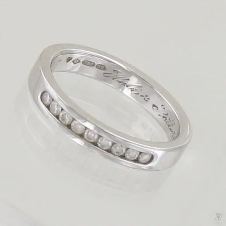 Timanttisormus 9xn.0.03ct, kaiverrettu, koko 19¾, A. Tillander vuodelta 2010, 750 valkokulta, paino 8,0g Paino: 8   g