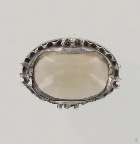 Kivintakoru, Kalevala Koru, 23x31mm, vuodelta 1954, 813br, paino 11,0g Paino: 11   g