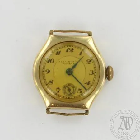 Kultarannekello, Alex Hüning Geneve, taulun Ø 22mm, mekaaninen, 585br, paino 10,3g Paino: 10,3 g