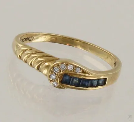 Timanttisormus sinisafiireilla 6xn.0.005ct, koko 17½, 585br, paino 2,0g Paino: 2   g