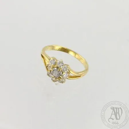 Timanttisormus 1xn.0.16ct ja 8xn.0.04ct, koko 14¾, 750, paino 2,3g