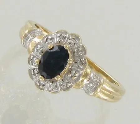 Sinisafiirisormus timanteilla 12xn.0.005ct, koko 17½, 585br, paino 2,8g